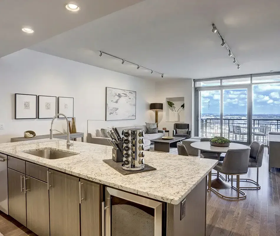 Modern luxury apartment community with pool and landscaped courtyard